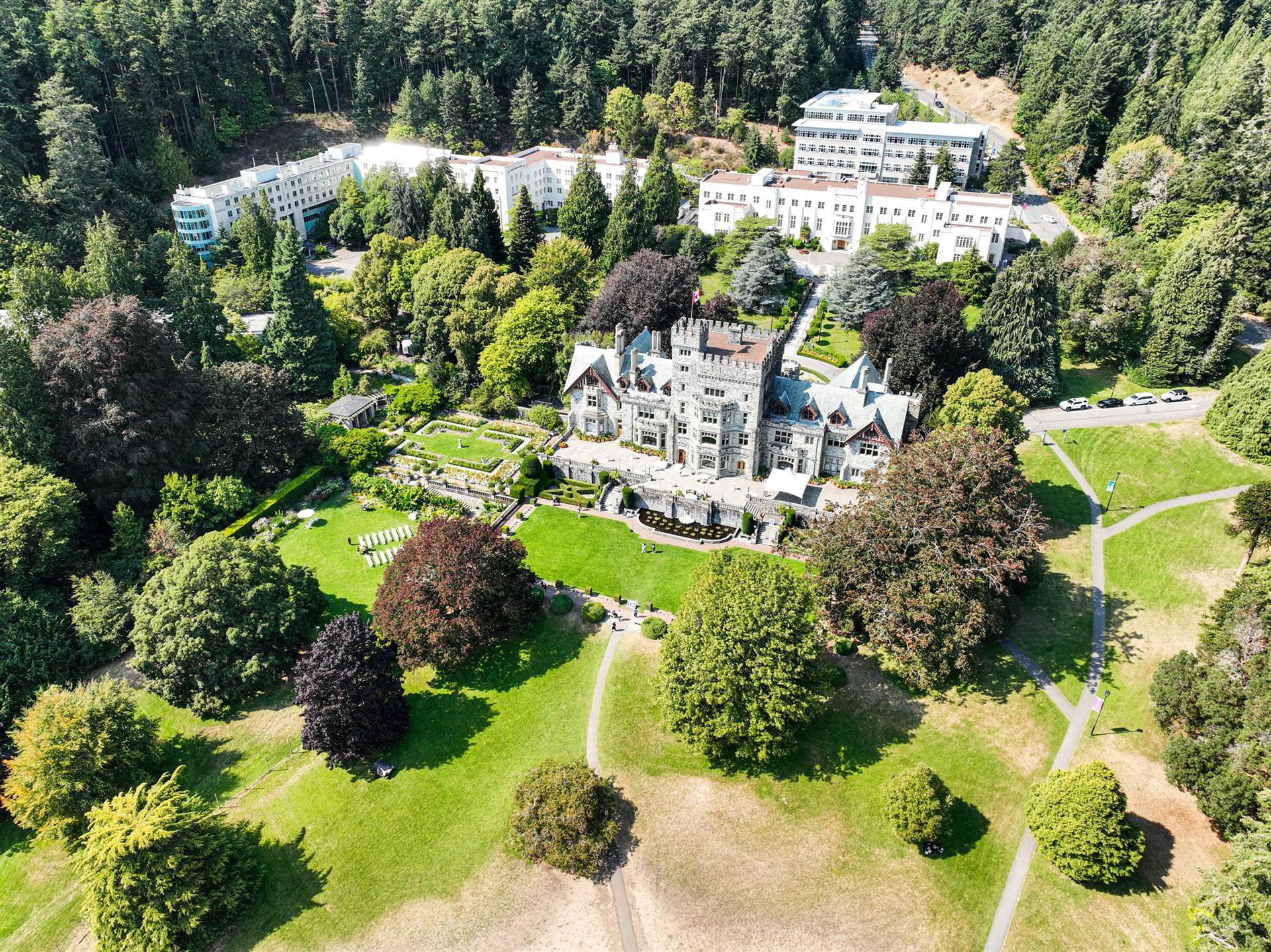 Aerial view of Hatley Castle and the Royal Roads University campus and gardens in Colwood