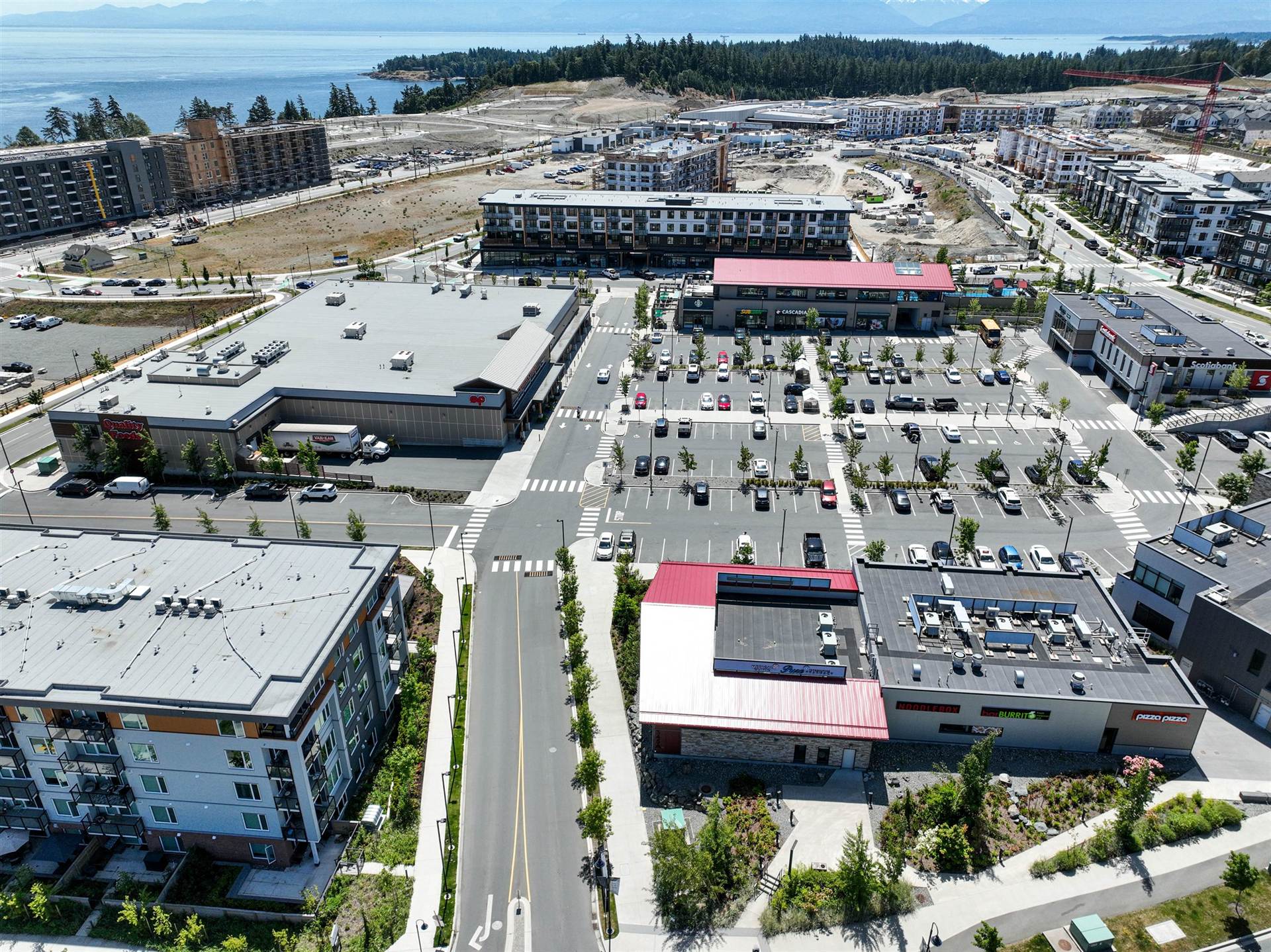 Aerial view of the Royal Bay retail village in Colwood, with the grocery store, bank and restaurants